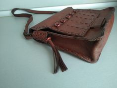 Vintage genuine leather bag - Retro leather bag - Old leather bag from 70' - brown leather bag - Old Genuine Leather Bag - Shoulder bag Beautiful shoulder bag made of genuine leather . For people who love items with history . Dimensions : Height without the handle - 25 cm x 23 cm x 6,5 cm For other GENUINE LEATHER BAG please check here : https://www.etsy.com/shop/TheVINTAGEShopBG?ref=l2-shopheader-name&section_id=22456024 All pictures are real . You buy exactly what you see in the photos . T Brown Textured Leather Saddle Bag Satchel, Brown Textured Leather Satchel Saddle Bag, Brown Soft Leather Rectangular Flap Bag, Brown Leather Shoulder Bag With Textured Leather, Brown Leather Shoulder Bag With Textured Finish, Brown Leather Shoulder Bag With Textured Detail, Brown Leather Satchel Flap Bag, Brown Leather Shoulder Flap Bag, Brown Leather Flap Shoulder Bag