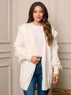 Get cozy and stylish with our Long Sleeve Open-Front Boho Fringe Cardigan! Perfect for any occasion with its unique boho fringe design and comfortable long sleeves. Stay trendy and warm in this must-have addition to your wardrobe. (Bonus points for pairing with your fave boots and a hot cocoa in hand!) * Color: White * 52% Acrylic 28% Polyamide 20% Spandex * Hand Wash * Model is wearing size S | Length: 29" Bust: 42" Waist: 21" Winter Outerwear With Tassels And Long Sleeves, Winter Long Sleeve Outerwear With Tassels, Casual Winter Sweater With Tassels, Bohemian Soft Knit Sweater For Fall, Spring Long Sleeve Sweater With Fringe, Fall Tassel Long Sleeve Sweater, Bohemian Fall Soft Knit Sweater, Fall Bohemian Soft Knit Sweater, Spring Fringe Long Sleeve Sweater