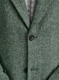 Looking for a trendy and stylish outfit for that big meeting or special occasion, our Harris Tweed Wide Herringbone Green Jacket is an ideal pick. Crafted from pure wool, the jacket has a sturdy yet sumptuous finish, special enough to create a sizzling impression, also the herringbone pattern on the outfit creates a chic silhouette making you look sophisticated. 
 
 Look Includes  Harris Tweed Wide Herringbone Green Fabric  Two Button Jacket Style  Wide Peak Lapel (3.75")  Horn Royal Black Butto Stylish Suits For Men, Leather Elbow Patches, Black Oxford Shoes, Black Oxfords, Dapper Style, Custom Suit, Peak Lapel, Button Jacket, Stylish Outfit