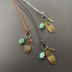 The boho feather Necklace features a custom engraved monogram charm and a turquoise Howlite stone, creating a beautiful bohemian necklace for women. This meaningful Native American jewelry also makes a thoughtful gift for him, blending style and personalization. 🪶 𝗠𝗔𝗧𝗘𝗥𝗜𝗔𝗟𝗦 + 𝗗𝗜𝗠𝗘𝗡𝗦𝗜𝗢𝗡𝗦 ❯  Turquoise Howlite, Silver-plated + Brass Feather, Leather Cording ❯  15mm Engraved Stainless Steel Charm (optional) 🪶 �𝗡𝗘𝗖𝗞𝗟𝗔𝗖𝗘 𝗦𝗧𝗬𝗟𝗘-- select from the following styles (see ph Thoughtful Gifts For Him, Monogram Pendant, Boho Feathers, Feather Necklace, Bohemian Necklace, Turquoise Howlite, Feather Necklaces, Necklace Women, Dark Brown Leather