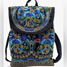 Women’s Vintage Boho Style Embroidered , Backpack, Travel, Handbag, Or Shoulder Bag, Black With Blue Flowers That Are Embroidered With Back Zip Pocket And Inside Zipper Pocket With Drawstring New Without Tags #4167 Embroidered Satchel Shoulder Bag For School, Embroidered Shoulder Bag For School, Black Embroidered Shoulder Bag For School, Traditional Shoulder Bag Backpack For Everyday Use, Traditional Style Backpack For Travel, Blue Embroidered Bags For Everyday Use, Multicolor Embroidery Bags With Adjustable Strap For Daily Use, Traditional Backpack For Travel, Traditional Style Travel Backpack