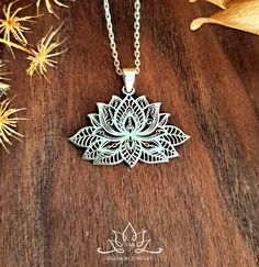 "Lotus Flower Handmade 925 Sterling Silver Necklace Lotus Flower Necklace is carefully produced in our workshop as handmade. Our jewelry, which will add art and elegance to your life, is a great choice for you and your loved ones. ⭐Also you can buy many products much cheaper with the \"Buy 2 Get 20% ◼️ Buy 3 Get 30% ◼️ Buy 4 Get 40% ◼️ Buy 5 Get 50% DISCOUNT ON CART\" campaign, which is valid on all our products. Lotus Flower Necklace * All our jewelry is custom made by hand with care in our wor Bohemian Sterling Silver Jewelry With Flower Charm, Bohemian Sterling Silver Flower Necklace, Spiritual Sterling Silver Necklace With Birth Flower, Silver Engraved Nature-inspired Necklace, Handmade Bohemian Jewelry Gift For Mom, Dainty Flower Pendant Jewelry For Meditation, Nature-inspired Engraved Silver Jewelry, Spiritual Engraved Flower Pendant Jewelry, Spiritual Flower Engraved Necklace