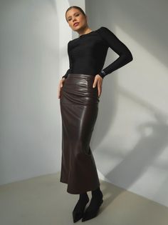 -Long faux leather skirt with a high waist, decorated with decorative seams in shades of the same tone. -Hidden zipper on the back area.  -The fabric is high quality, extremely soft and flexible, so it will not restrict your movements. -All products are designed and made by us.  -Composition: 100% polyester / 100% imitation leather. -Care: hand wash at 30oC. Do not use a dryer. Do not bleach. Do not compare. Model's height: 172cm/5'6 Model wears: size XS/US 2 /UK 4 (XS) US 2 /UK 4/- Waist 33 (66 cm), Hips 45 (90 cm), Total length 43.5 (87 cm) (S) US 4 /UK 6/- Waist 35 (70 cm), Hips 46 (92 cm), Total length 43.5 (87 cm) (M) US 6 /UK 8/- Waist 37 (74 cm), Hips 47 (94 cm), Total length 44 (88 cm) (L) US 8 /UK 10/- Waist 39 (78 cm), Hips 48 (96 cm), Total length 44.5 (89 cm) Long Leather Skirt, Decorative Seams, Dark Chocolate Brown, Don't Compare, Faux Leather Skirt, Womens Skirts, Leather Care, Lithuania, Chocolate Brown