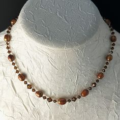 New Handmade Necklace Is Made Of Copper Brown Rice Pearls, Swarovski Smoky Topaz Crystals In Graduated Sizes, Silver-Lined Delica Seed Beads, A Silver-Plated Hook And Eye Clasp With An Extender. This Necklace Measures 16" Long And Has A 2-1/2" Extender. It Is Very Vintage Boho. * This Is A One-Of-A-Kind Necklace. * There May Be Some Color Discrepancies Due To Different Monitor Settings. The Colors Are Described As Clearly And Genuinely As Possible. * All Items Are Created In A Smoke-Free And Pet Pink Gemstone Necklace, Silver Drop Necklace, Rice Pearls, Star And Moon Necklace, Gold Moon Necklace, Rhinestone Statement Necklace, Smoky Topaz, Vintage Beads Necklace, Heart Locket Necklace