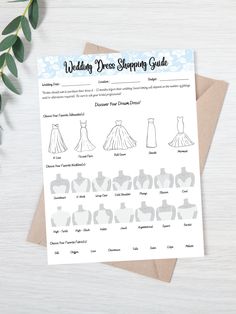 the wedding dress shopping guide is displayed on top of a card