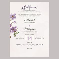 a wedding card with purple flowers on it