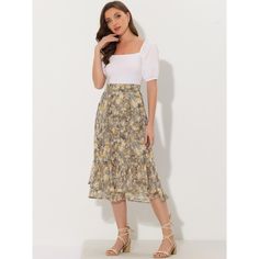 Featuring pretty ditsy floral prints, this midi skirt is a summer option that can be worn with just about anything. Channel elegant style in this midi skirt which is beautifully printed with a blossom pattern for a versatile look. It is made of lightweight fabric, adding definition to the free-flowing design. Falling to a waterfall midi hem, it sits high on the waist with a discreet side zip fastening. Summer days call for effortlessly feminine styles like skirts. Flowy Summer Midi-length Bottoms, Flowy Ruffled Midi Length Skirt, Summer Floral Print Tiered Skirt, Feminine Summer Maxi Skirt For Day Out, Spring Midi Ruffled Skirt, Casual Midi-length Skirt With Floral Print, Summer Floral Print Midi Maxi Skirt, Spring Floral Print Knee-length Skirt, Knee-length Floral Print Summer Bottoms