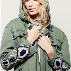 Never Worn Embroidered Green Parka From Free People Casual Outerwear With Floral Embroidery, Fall Outerwear With Multicolor Geometric Embroidery, Fall Multicolor Geometric Embroidered Outerwear, Embroidered Relaxed Fit Outerwear For Fall, Casual Embroidered Outerwear, Casual Fall Outerwear With Geometric Embroidery, Cotton Outerwear With Geometric Embroidery For Fall, Green Bohemian Outerwear With Pockets, Embroidered Green Outerwear For Fall