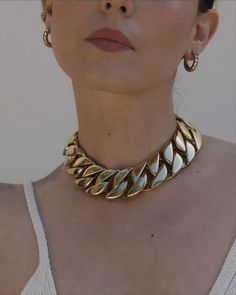 Our favorite statement chain shortened for THAT vibe. Choker measures 16" in length and 1.25" wide - 18k Gold plated Stainless Steel Estimated Ship Date: January 10th Luxury Gold-tone Chunky Chain Necklace, Metal Curb Chain Link Jewelry, Brass Chain Choker Necklace, Cuban Link Metal Jewelry For Parties, Metal Curb Chain Jewelry, Luxury Chunky Chain Metal Necklace, Yellow Gold Metal Curb Chain Jewelry, Luxury Gold Chain Choker Jewelry, Yellow Gold Curb Chain Jewelry