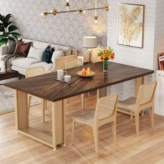 a living room and dining area with wood flooring