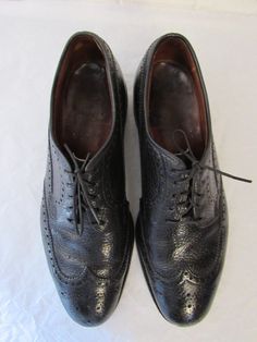 "Vintage 1950s 60s black Ranch Oxhide leather wing tip shoes. Lace up. High quality, made in England By Church's. Size 9. The soles measure 11.75\" long and 4.25\" wide. Shoes are in very good condition with some minor scratches." Black Oxfords With Brogue Detailing And Snip Toe, Retro Black Oxfords For Derby, Retro Black Wingtip Oxfords, Retro Black Cap Toe Oxfords, Retro Black Oxfords With Leather Sole, Black Leather Retro Oxfords, Retro Style Lace-up Oxfords For Formal Occasions, Retro Wingtip Oxfords For Business, Retro Formal Oxfords With Leather Sole