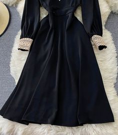 Elegant v neck lace long sleeve dress black dress Fabric: blended Color: black Size(cm): S, M, L, XL S length 108 bust 92-98 sleeve length 57 M length 109 bust 96-104 sleeve length 58 L length 110 bust 100-108 sleeve length 59 XL length 111 bust 104-112 sleeve length 60 Elegant Long Sleeve V-neck Dress For Night Out, Elegant Long Sleeve Dress For Winter Date Night, Elegant Long Sleeve Winter Dress For Date Night, Elegant Winter Long Sleeve Dress For Date Night, Black V-neck Long Sleeve Dress For Spring, Elegant Long Sleeve Dress With Lace Sleeves For Evening, Formal Long Sleeve Midi Dress With Lace Trim, Winter Evening Dresses With Lace Sleeves, Black Long Sleeve Evening Dress For Winter