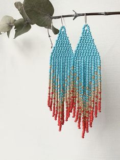 Turquoise/red earrings Native beaded earrings Dangle Fringe | Etsy Summer Long Drop Earrings With Dangling Beads, Summer Beaded Fringe Chandelier Earrings As Gift, Summer Jewelry With Dangling Beads And Long Drop, Trendy Dangle Jewelry With Tiny Beads, Colorful Beaded Tassel Drop Earrings As Gift, Trendy Beaded Dangle Chandelier Earrings, Summer Jewelry With Colorful Long Drop Beads, Summer Dangle Jewelry With Tiny Beads, Summer Beaded Chain Earrings As Gift