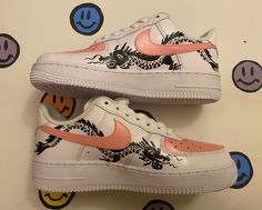 All White Air Force 1. Custom painted with high quality leather paint and sealed with an acrylic finisher.  Choose one color from the list to customize these shoes to match your style.  Primary Color (main shoe color, pink in image) Dragon is located on the inner panel of both shoes. The dragon is painted black. You may contact me if a different color is desired for the dragon, available colors are the same as the ones listed in the primary color list.  You may message me before ordering to chec Customizable Pink Sneakers With Round Toe, Customizable Pink Sporty Sneakers, Custom Pink Leather Sneakers, Pink Custom Sneakers With Round Toe, Customizable Pink Round Toe Sneakers, Casual Custom Pink Sneakers With Waterproof Paint, Custom Hand Painted Pink Sneakers With Round Toe, Hand Painted Pink Custom Sneakers With Round Toe, Casual Pink Custom Sneakers With Waterproof Paint