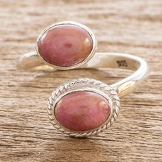 Working with cabochons of natural rhodonite Zandra Lorena Sajbin creates this lovely wrap-style ring. The ring is crafted from sterling silver and features one plain bezel and one rope-edged bezel. Rhodonite Ring, Wrap Ring, Jade Jewelry, Soft Natural, Wrap Rings, The Ring, Jewelry Packaging, Gorgeous Earrings, Jewelry Gift Box