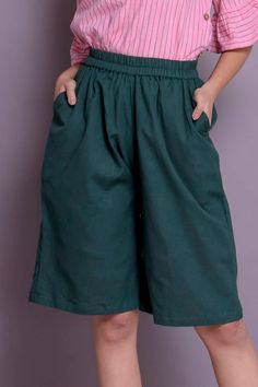 "Linen short pants, Skirt shorts, Short palazzo pants, Knee length pants, Wide leg short pants - Custom made by Modernmoveboutique. >DESCRIPTION< - Length of the pants - 24\" (61 cm) - If you want to customize the length, please mention in 'Note to seller' section while ordering these pants. - loose and roomy. - made from Linen blend. The fabric is of medium weight (185 g). - the model is 172 cm high (regular XS - S) and is wearing size S. - color or pattern in the picture - BOTTLE GREEN ( Wide Leg Shorts With Built-in Shorts, Solid Casual Pants With Built-in Shorts, Summer Capris With Built-in Shorts, Solid Color Knee-length Bermuda Shorts With Elastic Waistband, Green Wide-leg Bottoms With Elastic Waistband, Solid Bermuda Shorts With Elastic Waistband, Green Wide Leg Bottoms With Elastic Waistband, Green Wide-leg Shorts With Pockets, Green Wide Leg Shorts With Pockets