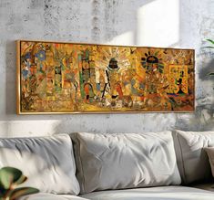 a painting hanging on the wall above a couch