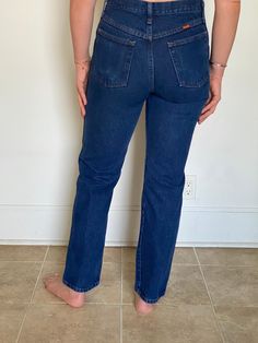 "Vintage 80s Rustler jeans in indigo wash denim, 100% cotton  Size 30 x 32  Fits a women's 28  Excellent condition  Measurements: laying flat  Waist: 15\"  Inseam: 32\"  Hips: 19\"" Dark Wash Retro Mid-rise Jeans, Retro Dark Wash Mid-rise Jeans, 90s Dark Wash Relaxed Fit Jeans, 90s Style Dark Wash Denim Jeans, Vintage Everyday Flare Jeans With Five Pockets, Vintage Flare Jeans With Five Pockets For Everyday, Everyday Vintage Flare Jeans With Five Pockets, Retro Dark Wash Rigid Denim Jeans, Retro Straight Leg Denim Jeans