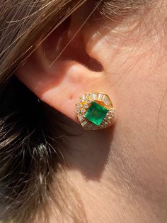 "Pacific Jewelry Presents, Vintage natural Colombian Emeralds, featuring two exquisite square cut Emeralds weighing approx. 1.70 carats (total) and adorned with lively colorless natural diamonds. Diamonds are an assortment of baguette and round cut, approx. 1.35 carats (total). These beautiful earrings are mounted in 18k yellow gold, and have a safe push back closure made in 14k gold for extra strength and durability. The Emeralds are of the highest quality and are untreated. The deep \"muzo gre Formal Fine Jewelry Cluster Earrings With Baguette Diamonds, Luxury Yellow Gold Cluster Earrings With Gemstones, Elegant Gemstone Baguette-cut Earrings, Luxury Gia Certified Yellow Gold Earrings, Gia Certified Luxury Yellow Gold Earrings, Gia Certified Classic Evening Jewelry, Emerald Cut Diamond Earrings Fine Jewelry, Emerald Cut Diamond Fine Jewelry Earrings, Fine Jewelry Emerald Cut Diamond Earrings