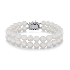 MIKIMOTO offers exquisite pearl and diamond jewelry, setting the highest standards for quality and craftsmanship. From MIKIMOTO, this timeless bracelet is designed with a double strand of A quality, 6.5-7mm, white Akoya cultured pearls. It also features their signature clasp accented by a 3.5-4mm cultured Akoya pearl and 18k white gold "M" charm. The bracelet measures 1/4" in width and 7" in length. Pearl And Diamond Jewelry, Timeless Bracelet, Akoya Pearls, Strand Bracelet, Cultured Pearls, Diamond Jewelry, White Gold, Bracelet, Gold