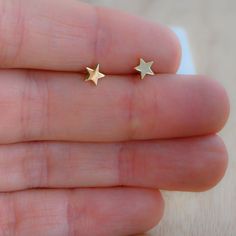 Tiny, plain minimalist star earrings! Perfect for a dainty look or on multiple piercings! ►► Details ▸ Measures 5mm x 5mm ▸ Made of 925 Sterling Silver plated in 14k Gold, 14k Rose Gold, or Rhodium ▸ We use a THICK plating for piece that will last you years to come ▸ Sold as a PAIR ▸ Push back closure ▸ Nickel-free ▸ Hypo-allergenic ✈️Ships outs SAME DAY for fast delivery. Domestic Orders are delivered at your doorstep in 2-3 days! 🎁Packaged in a white gift box, ready for gift-giving! If you ha Everyday Star Shaped Pierced Earrings, Minimalist Star Earrings For Everyday, Minimalist Star Charm Earrings As Gift, Hypoallergenic Star-shaped Everyday Earrings, Hypoallergenic Star Earrings For Everyday, Everyday Hypoallergenic Star Earrings, Minimalist Star Charm Earrings For Everyday, Minimalist Star Charm Earrings, Dainty Tiny Star Earrings