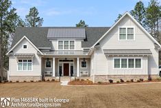 a large white house with lots of windows