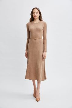 Immerse yourself in the essence of refined luxury with our soft touch Rib Cashmere Knit Dress. This long sleeve midi dress features an easy A-line silhouette & self-belt that is adorned with a gold buckle. Ultra-Soft & understated, this dress defines quiet luxury and can be worn with pumps or the seasons knee grazing boots. Long Sleeve Cashmere Midi Dress with Self Belt & gold buckle 100% Cashmere Runs true to size Model is 5'9" and wearing size S Dry Clean Only Imported Style #: ETR44242 Boots Long, Cashmere Sweater Dress, Belt Gold, Long Sleeve Short Dress, Quiet Luxury, Sleeve Midi Dress, Long Sleeve Midi, Knit Tees, The Seasons