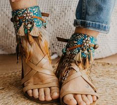 Boho Feather Sandals - Unique Ankle Cuffs for Summer Festivals and Casual Chic Style Step into effortless summer style with these handmade boho feather ankle wraps. Designed to transform your everyday sandals into eye-catching footwear, these adjustable ankle cuffs are crafted with care using premium materials like leather straps, metal buckles, and soft feathers in warm sand tones. Whether you're heading to a music festival, strolling along the beach, or embracing your bohemian spirit, these an Adjustable Ankle Wrap Barefoot Sandals For Summer, Adjustable Ankle Tie Sandals For Festival, Bohemian Toe Loop Sandals For Spring, Handmade Summer Ankle Wrap Anklets, Bohemian Anklets For Beach In Spring, Adjustable Ankle Strap Anklets For Summer, Handmade Ankle Wrap Anklets For Summer, Adjustable Anklets With Ankle Strap For Summer, Handmade Summer Anklets With Ankle Wrap