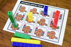 the gingerbread counting times game is ready to be played on the table with legos