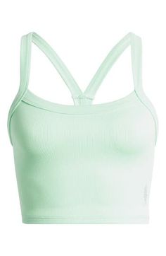 A cropped, racerback cut defines this rib camisole that's always ready for layering, lounging, lunging, lay-ups—you get the idea. 14" length (size Medium/Large) Scoop neck Racerback 87% polyamide, 13% elastane Dry clean or machine wash, dry flat By Free People; made in Turkey Trendy Ribbed Sports Bra For Spring, Spring Ribbed Sports Bra For Workout, Green Tank Sporty Crop Top, Ribbed Crop Top For Gym In Spring, Green Sporty Tank Crop Top, Sporty Cropped Tops With Adjustable Straps, Spring Ribbed Crop Top For Gym, Sporty Green Tank Crop Top, Spring Cropped Sports Bra With Adjustable Straps