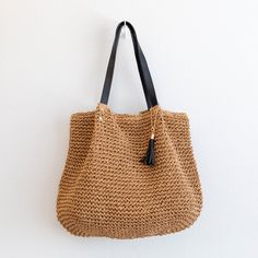 NOW AVAILABLE IN STOCK. FAST SHIPPING FROM LOS ANGELES. 3-5 DAYS Large straw woven tote bag with leather straps and tassel perfect for all occasions. A classic look with the durability and convenience of leather straps, perfect for wherever your day takes you. Size: 15"H x 17"W Designer Style ID: 8472 Large Straw Woven Tote Bag with Leather Straps, Summer Bag, Everyday Shoulder Bag, Beach Bag Everyday Shoulder Bag, Crochet Shoulder Bags, Woven Tote Bag, Summer Bag, Designer Style, Beach Bag, Classic Looks, Leather Straps, Shoulder Bags