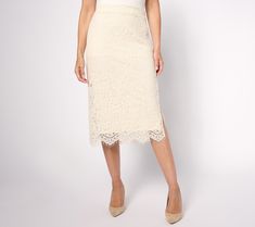 We're so in love with this lace midi skirt. Finished with a scalloped and eyelash trim along the hem, this pretty yet polished style makes a graceful entrance anywhere you go. From Isaac Mizrahi Live!TM. Feminine Scalloped Lace Bottoms, Elegant White Bottoms With Scalloped Lace, Elegant Lace Bottoms With Lace Trim, Delicate Lace Skirt For Spring, Chic Fitted Bottoms With Scalloped Lace, Elegant Fitted Skirt With Scalloped Lace, Chic Lace Pencil Skirt, Elegant Fitted Scalloped Lace Skirt, Lace Trim Midi Skirt