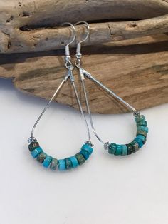 These beautiful earrings have a fun boho style! Made with Silver Teardrop hoop wires with gorgeous 4mm heishi imperial jasper stone beads in bold bright blue turquoise and beige brown!  The earring itself measures  approximately 2 inches in length by one inch wide. The ear wires are lead and nickel free.  Beautiful statement earrings that can be dressed up or down and worn throughout the year! Bold, beautiful boho style!! Your Boho style earrings will come packaged in a pretty gift box, ready fo Turquoise Dangle Hoop Earrings With Colorful Beads, Bohemian Turquoise Hoop Earrings Nickel Free, Bohemian Heishi Beads Hoop Earrings As Gift, Bohemian Nickel-free Heishi Beads Earrings, Bohemian Heishi Beads Dangle Earrings, Handmade Blue Heishi Beads Earrings, Bohemian Dangle Earrings With Heishi Beads, Bohemian Hoop Beaded Earrings With Heishi Beads, Bohemian Hoop Earrings With Heishi Beads