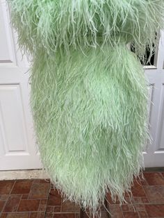 "Miki light green ostrich feather mini dress cocktail dress -Made to order -Please check my sizes chart before ordering -If it's doesn't fit with my size chart please measure your bust waist and hips -Dress made with ostrich feathers -Zipper closure on the back side -Straps can be taken off -Color: more than 18 colors -Dry clean only SGinstar Size Guide UK4/US0/EU32/AU4 Bust 31\"(78cm.) Waist24\"(60cm.) Hips33\"(83.5cm.) UK6/US2/EU34/AU6 Bust32\"(80.5cm.) Waist25\"(63cm.) Hips34\"(86cm.) UK8/US4 Strapless Feather Trim Dress For Prom Season, Spring Dresses With Ostrich Feathers, Green Mini Dress For Prom Season, Feathered Dresses For Wedding And Prom Season, Feathered Mini Dress For Prom Season, Green Mini Dress For Cocktail And Prom Season, Green Mini Dress For Cocktail During Prom Season, Spring Dresses With Ostrich Feather Trim, Green Cocktail Mini Dress For Prom Season