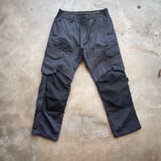 [DESCRIPTION] Please read the description first before buy my items‼️‼️‼️ Vintage Field Core Cordura Tactical Pants All in good condition [MATERIAL] Cutton [MEASUREMENT] Measurement ( WHEN LAID FLAT ): Waist: 32 inch (recommended) Insean: 26 inch Length: 36 inch Front Rise: 12 inch Thigh: 22 inch Opening Leg: 15 inch [CONDITION] - All in good condition  - Kindly please refer photo [PAYMENT & NOTICE] - No return/refund - All items will be post over shipping company counter within 1-3 working days Techwear Bottoms With Tapered Leg And Multiple Pockets, Military Style Black Bottoms For Outdoor Work, Black Military Style Bottoms For Outdoor Work, Black Work Pants With Pockets For Outdoor Work, Black Work Pants With Pockets For Outdoor, Combat Style Pants With Multiple Pockets, Combat Style Straight Leg Bottoms For Outdoor, Black Military Cargo Pants For Outdoor Work, Full Length Outdoor Work Pants With Side Pockets