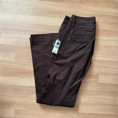 Gap Modern Fit, Stretch Pants Size: 2 Condition: New With Tags Gap Stretch Pants Sits Low On The Waist And Straight Through The Hip Color: Brown Gap Wide Leg Fall Pants, Gap Wide Leg Pants For Fall, Stretch Brown Pants For Work, Stretch Brown Full-length Dress Pants, Fitted Brown Jeans, Gap Stretch Bottoms For Fall, Stretch Brown Wide Leg Pants For Workwear, Stretch Bottoms By Gap For Fall, Gap Fitted Cotton Jeans