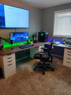 a computer desk with two monitors on it