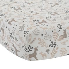 an image of a baby crib sheet with deers on it