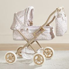 a baby's pram is shown on the floor