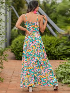 Be the flower of the party with our Cynthia Floral V-Neck Boho Maxi Dress! This beautiful dress features a flirty v-neck and a flowy boho style, perfect for a fun and carefree look. Stand out in this dress, make a statement, and have a good time! Size Guide: Model is 5’8” tall, and has a 33.5” bust, 26.6” waist, & 35.7” hips. She is wearing a S / US 4 / AU 8. This dress is true to size. Material: Self & Lining 100% Polyester. Feature: V-neckline. Sleeveless. Adjustable straps. Floral Boho print. Flowy V-neck Sundress For Garden Party, Flowy V-neck Beach Dress For Party, Flowy Floral Print Dress For Summer Parties, Multicolor Maxi Floral Dress For Vacation, Multicolor Floral Maxi Dress For Vacation, Multicolor Maxi Length Floral Dress For Vacation, Bohemian Beach Dress With Floral Print For Summer Parties, Flowy Floral Print Dress For Beach Party, V-neck Floral Print Dress For Summer Parties