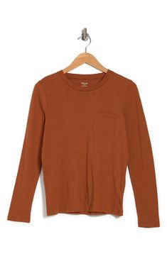 Perfect for styling versatile looks, this long sleeve T-shirt is a wardrobe essential. 23 1/2" length (size Medium) Crewneck Long sleeves Chest patch pocket 100% cotton Machine wash, dry flat Imported Women's Clothing Casual Brown T-shirt For Fall, Solid Crew Neck T-shirt For Fall, Solid Color T-shirt For Fall Layering, Solid Color T-shirt For Layering In Fall, Fall Layering T-shirt, Fall Layering Solid Color T-shirt, Fall Casual Crew Neck T-shirt, Fall Layering Crew Neck T-shirt, Casual Crew Neck T-shirt For Fall