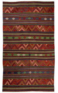 a red and green striped rug with different colors on it's sides, including the middle