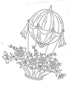 a hot air balloon with flowers in it