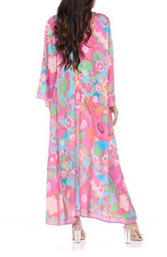 Go from beach to boardwalk in a flowery border-print cover-up wrap with a front-tie closure for easy layering. 54" length Shawl collar Long sleeves 100% polyester Hand wash, dry flat Imported Floral Duster, Border Print, Spring Trends, Women Men Shoes, Swimwear Cover, Mens Spring, Bridal Shop, Shawl Collar, Nordstrom Rack