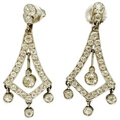 These very pretty dangle earrings are finely handcrafted in platinum. The details are as follows : Diamond weight : 2 carat ( GH color and VS clarity ) Metal : Platinum Measurements : 1 1/4 inch long White Diamond Dangle Earrings, Pretty Dangle Earrings, Pretty Earrings Dangle, Diamond Dangle Earrings, 2 Carat, The Details, White Diamond, Diamond Jewelry, Jewelry Earrings Dangle