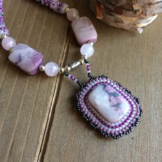 Handmade Spiritual Pink Beaded Necklaces, Handmade Pink Spiritual Beaded Necklace, Artisan Pink Beaded Necklace, Pink Agate Beaded Necklaces, Pink Agate Beaded Necklace, Pink Gemstone Beads Necklace For Festival, Handmade Purple Bohemian Necklaces, Purple Handmade Bohemian Necklaces, Bohemian Pink Crystal Necklace With Gemstone Beads