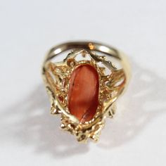 -Vintage 14k Gold Natural Orange Momo Coral with Diamond Ring 6.25US -Ring size: 6.25US -Coral size: 20.2 mm x 10 mm -Diamond size: 2.55 mm -Total weight: 8.5 g -Marked 14k -Total of 4 diamonds Vintage Opal Ring In 14k Gold, Vintage 14k Stamped Opal Ring For Formal Occasions, Vintage 14k Gold Opal Ring, Vintage Opal Ring With Polished Finish For Formal Occasions, Collectible Yellow Gold Opal Ring, Vintage Opal Ring For Anniversary With Polished Finish, Estate Style 14k Stamped Gold Jewelry, Estate Style 14k Gold Oval Jewelry, Vintage Yellow Gold Opal Ring