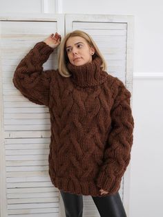 "Brown turtleneck wool sweater with a slightly loose fit, perfect for everyday styles. The chunky, long sleeve design has 3 layers of high quality wool for maximum comfort and coziness. DETAILS - The sweater has 3 layers of wool - Made from 100% wool - The sweater is knitted with 88 oz (2500 g) of high quality premium wool - The model is 170 cm tall (regular S) - The sweater on picture is size XL - As mostly all models in our shop the sweater is loose fit - Colour on photo - brown FIT - The swea Brown Cable Knit Turtleneck For Fall, Cozy Knitted Turtleneck For Cold Weather, Cozy Chunky Knit Polo Sweater For Winter, Winter Long Sleeve Chunky Knit Turtleneck, Casual Wool Turtleneck With Chunky Knit, Casual Wool Chunky Knit Turtleneck, Casual Chunky Knit Wool Turtleneck, Winter High Neck Chunky Knit Sweater, Winter High-neck Chunky Knit Sweater