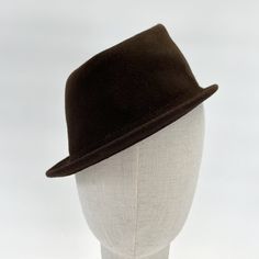 Small hat for self-decoration. Colour Espresso brown Material 100% wool Head circumference one size fits all The hat is already decorated with a grosgrain ribbon and a hat elastic on the inside. Brown Fur Felt Fedora With Short Brim, Brown Wool Fedora With Flat Brim, Brown Fur Felt Fedora Hat, Brown Wool Fedora With Curved Brim, Brown Wool Fedora, Brown Felt Hat With Short Brim, Brown Short Brim Fur Felt Hat, Brown Wool Cloche Hat With Curved Brim, Brown Wool Cloche Hat With Short Brim