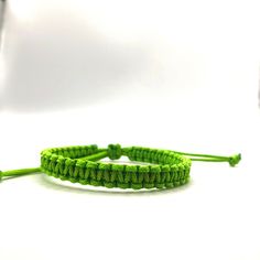 This bracelet is make with Chinese Knotting Cord about 1.5mm thin cord. The Bracelet is adjustable in size, 6 inches closed to 12 1/2 inches. Color: Light Green Feel free to contact me for any question!! *Color may slightly different due to the lighting!! ** This is HANDMADE item, the color of pattern, shape might be little different Diy String Bracelets, Green String Bracelet, Chinese Knotting Cord, Chinese Knotting, Diy Bracelets With String, Braid Bracelet, Green Diy, Surfer Bracelets, Lucky Bracelet